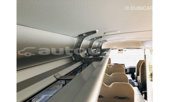 Buy Import Toyota Coaster White Car in Import - Dubai in Andijon Buy Import Toyota Coaster White Car in Import - Dubai in Andijon