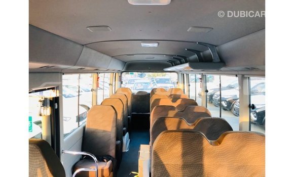 Buy Import Toyota Coaster White Car in Import - Dubai in Andijon Buy Import Toyota Coaster White Car in Import - Dubai in Andijon