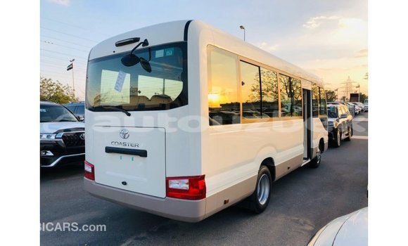 Buy Import Toyota Coaster White Car in Import - Dubai in Andijon Buy Import Toyota Coaster White Car in Import - Dubai in Andijon