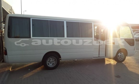 Buy Import Toyota Coaster White Car in Import - Dubai in Andijon Buy Import Toyota Coaster White Car in Import - Dubai in Andijon