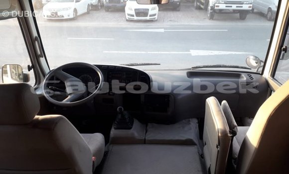 Buy Import Toyota Coaster White Car in Import - Dubai in Andijon Buy Import Toyota Coaster White Car in Import - Dubai in Andijon
