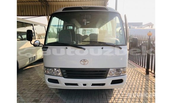 Buy Import Toyota Coaster White Car in Import - Dubai in Andijon Buy Import Toyota Coaster White Car in Import - Dubai in Andijon
