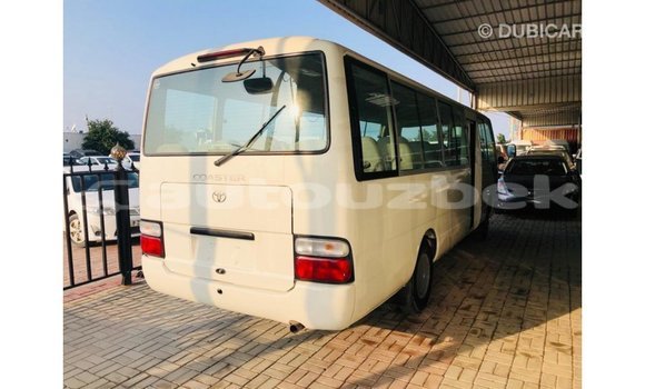 Buy Import Toyota Coaster White Car in Import - Dubai in Andijon Buy Import Toyota Coaster White Car in Import - Dubai in Andijon