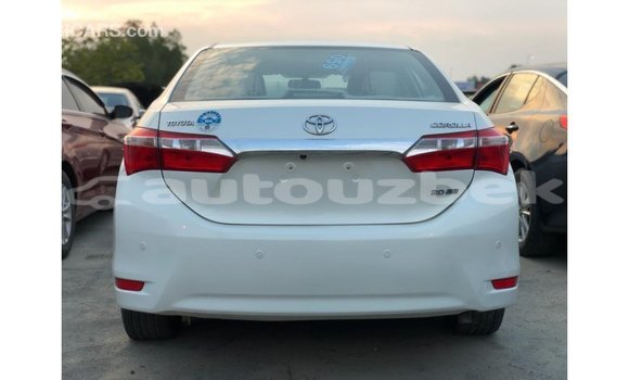 Buy Import Toyota Corolla White Car in Import - Dubai in Andijon Buy Import Toyota Corolla White Car in Import - Dubai in Andijon