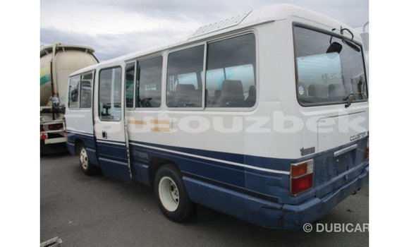 Buy Import Toyota Coaster White Car in Import - Dubai in Andijon Buy Import Toyota Coaster White Car in Import - Dubai in Andijon