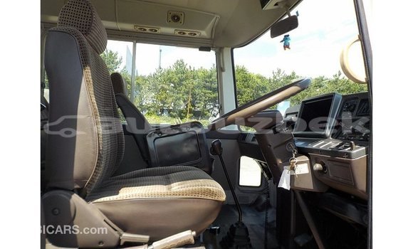 Buy Import Toyota Coaster White Car in Import - Dubai in Andijon Buy Import Toyota Coaster White Car in Import - Dubai in Andijon
