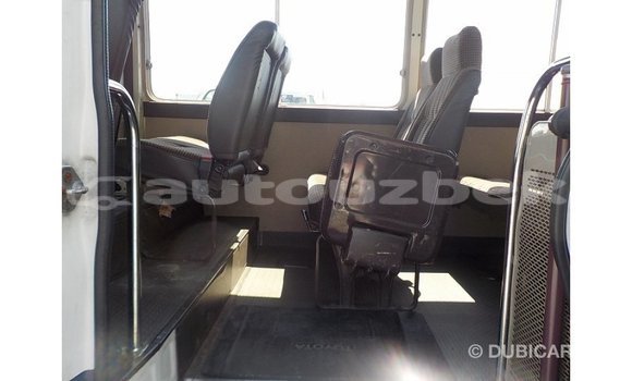 Buy Import Toyota Coaster White Car in Import - Dubai in Andijon Buy Import Toyota Coaster White Car in Import - Dubai in Andijon