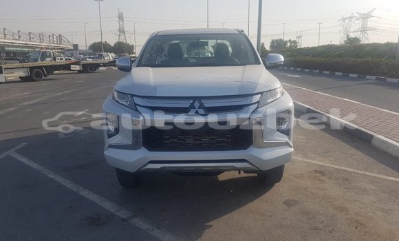 Buy Import Mitsubishi L200 White Car in Import - Dubai in Andijon