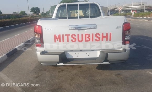 Buy Import Mitsubishi L200 White Car in Import - Dubai in Andijon Buy Import Mitsubishi L200 White Car in Import - Dubai in Andijon