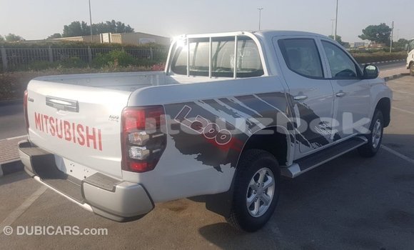 Buy Import Mitsubishi L200 White Car in Import - Dubai in Andijon Buy Import Mitsubishi L200 White Car in Import - Dubai in Andijon