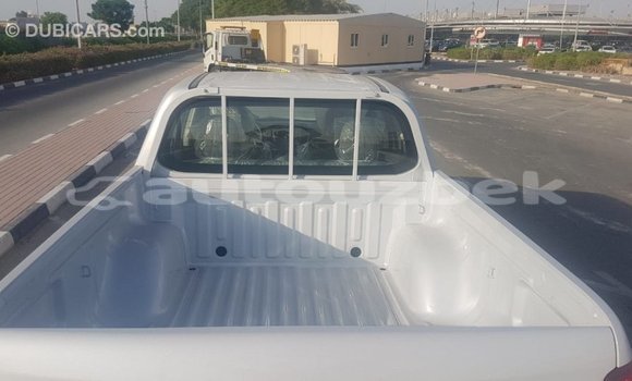 Buy Import Mitsubishi L200 White Car in Import - Dubai in Andijon Buy Import Mitsubishi L200 White Car in Import - Dubai in Andijon