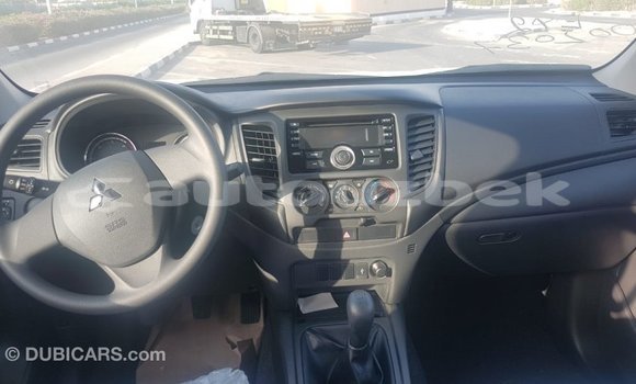 Buy Import Mitsubishi L200 White Car in Import - Dubai in Andijon Buy Import Mitsubishi L200 White Car in Import - Dubai in Andijon
