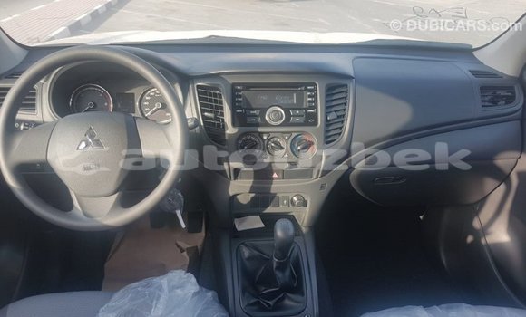 Buy Import Mitsubishi L200 White Car in Import - Dubai in Andijon Buy Import Mitsubishi L200 White Car in Import - Dubai in Andijon