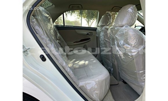 Buy Import Toyota Corolla White Car in Import - Dubai in Andijon Buy Import Toyota Corolla White Car in Import - Dubai in Andijon