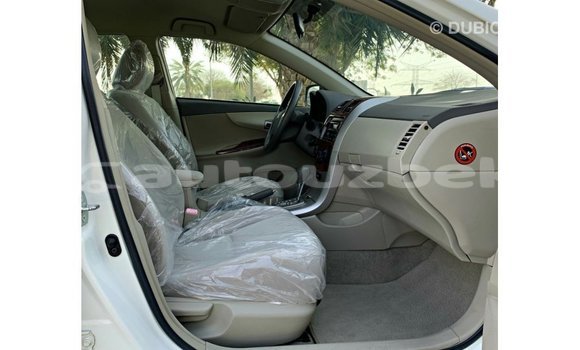 Buy Import Toyota Corolla White Car in Import - Dubai in Andijon Buy Import Toyota Corolla White Car in Import - Dubai in Andijon