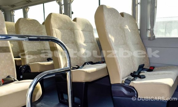 Buy Import Toyota Coaster White Car in Import - Dubai in Andijon Buy Import Toyota Coaster White Car in Import - Dubai in Andijon
