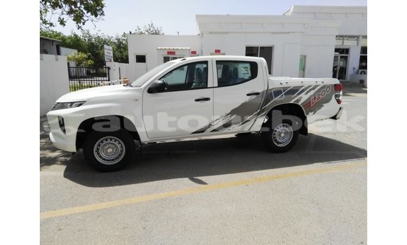 Buy Import Mitsubishi L200 White Car in Import - Dubai in Andijon Buy Import Mitsubishi L200 White Car in Import - Dubai in Andijon
