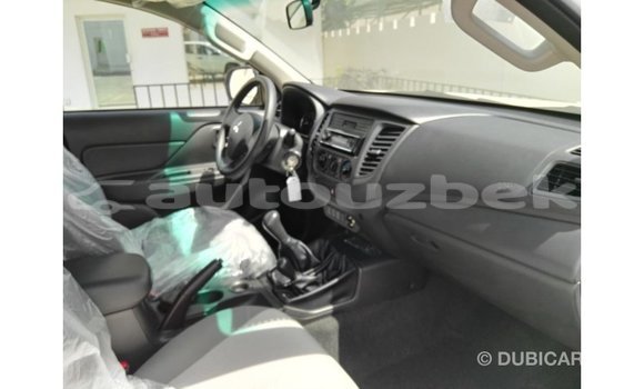 Buy Import Mitsubishi L200 White Car in Import - Dubai in Andijon Buy Import Mitsubishi L200 White Car in Import - Dubai in Andijon