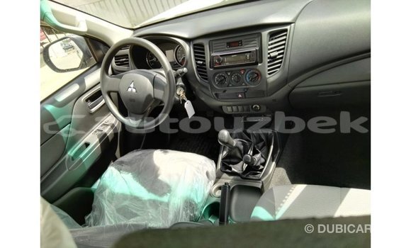 Buy Import Mitsubishi L200 White Car in Import - Dubai in Andijon Buy Import Mitsubishi L200 White Car in Import - Dubai in Andijon