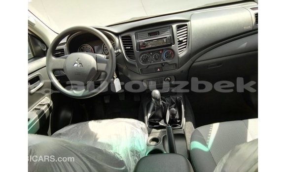 Buy Import Mitsubishi L200 White Car in Import - Dubai in Andijon Buy Import Mitsubishi L200 White Car in Import - Dubai in Andijon